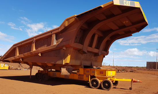 Custom designed OEM Group tray transporter carrying mining tray in red dirt