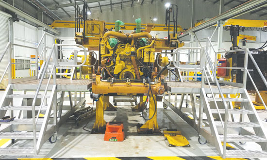 Two custom designed work platforms in a mining workshop 