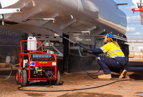 High Pressure Cleaning the underside of a water truck