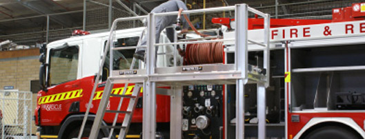 Fire Department Using Steprite Access Platform to Check Truck