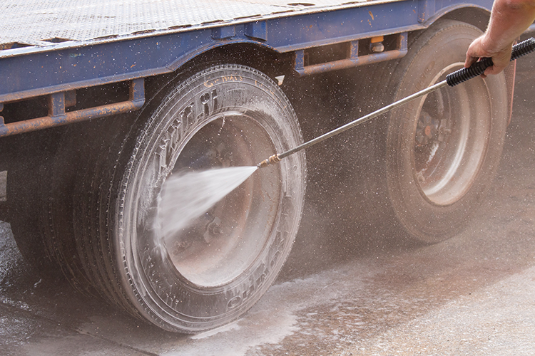 High Pressure Cleaning a Trucks Wheel.