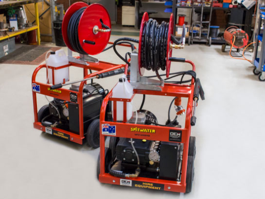 Two Spitwater Hire Pressure Cleaners On the Workshop Floor