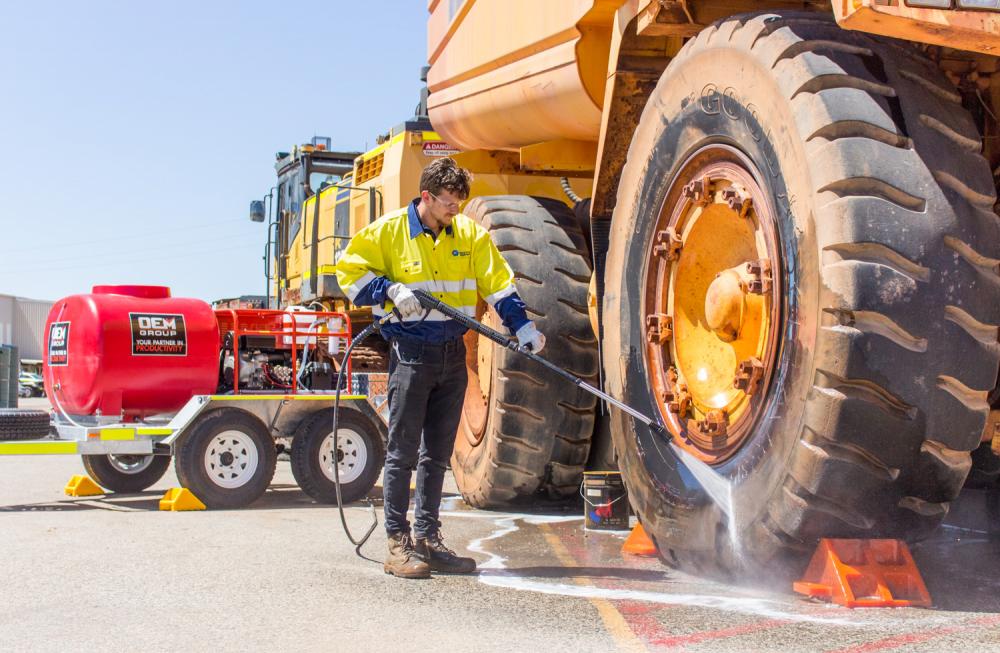 Cleaning Mining Truck Tyres with Diesel Pressure Cleaner Mounted Trailer