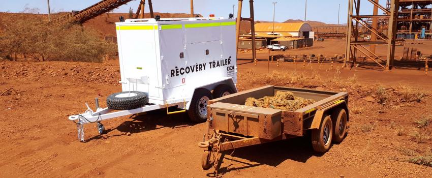 OEM Group's Recovery trailer next to an old trailer holding the rope on a minesite.
