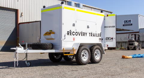 Heavy vehicle recovery trailer in yard