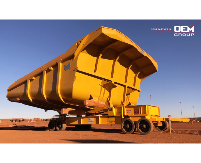 Tray transporter in red dirt on mine site