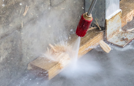 PA Pressure Washer Turbo Lance Blasting Apart a Piece of Wood